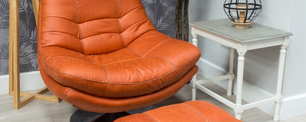 orange swievel chair at mcvann furniture